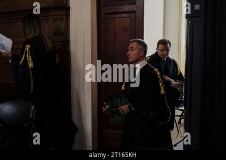 Reggio Calabria, Catanzaro, Italy. 11th Oct, 2023. Magistrates seen while entering in the room. The Court of Appeal of Reggio Calabria, guided by magistrate Elisabetta Palumbo, sentenced the former pro-migrant mayor Domenico Lucano to 1 year and six months of reclusion, with suspended pena. In October 2021, Lucano was sentenced by the Court of Locri to 13 years and two months of reclusion, for fraud and mismanagement of funds for migrants. (Credit Image: © Valeria Ferraro/ZUMA Press Wire) EDITORIAL USAGE ONLY! Not for Commercial USAGE! Stock Photo