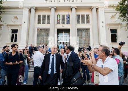 Reggio Calabria, Catanzaro, Italy. 11th Oct, 2023. Lawyers and people seen celebrating after the verdict. The Court of Appeal of Reggio Calabria, guided by magistrate Elisabetta Palumbo, sentenced the former pro-migrant mayor Domenico Lucano to 1 year and six months of reclusion, with suspended pena. In October 2021, Lucano was sentenced by the Court of Locri to 13 years and two months of reclusion, for fraud and mismanagement of funds for migrants. (Credit Image: © Valeria Ferraro/ZUMA Press Wire) EDITORIAL USAGE ONLY! Not for Commercial USAGE! Stock Photo