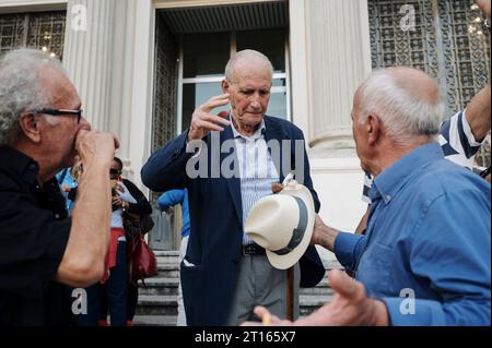 Reggio Calabria, Catanzaro, Italy. 11th Oct, 2023. People seen celebrating outside the Court. The Court of Appeal of Reggio Calabria, guided by magistrate Elisabetta Palumbo, sentenced the former pro-migrant mayor Domenico Lucano to 1 year and six months of reclusion, with suspended pena. In October 2021, Lucano was sentenced by the Court of Locri to 13 years and two months of reclusion, for fraud and mismanagement of funds for migrants. (Credit Image: © Valeria Ferraro/ZUMA Press Wire) EDITORIAL USAGE ONLY! Not for Commercial USAGE! Stock Photo