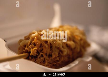 Japanese Ramen Corndog with mayonnaise topping Stock Photo