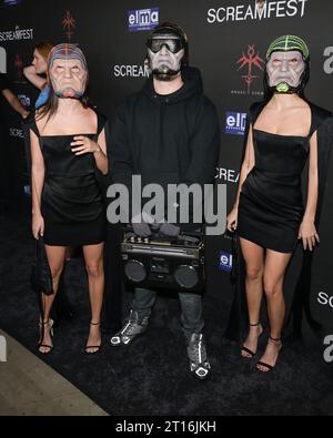 October 10, 2023, Hollywood, California, United States: Renee Herbert, Eddie Alcaraz and Elisha Herbert attend the opening night of the 23rd Screamfest Horror Film Festival, featuring the Los Angeles premiere of Utopia's ''Divinity' (Credit Image: © Billy Bennight/ZUMA Press Wire) EDITORIAL USAGE ONLY! Not for Commercial USAGE! Stock Photo