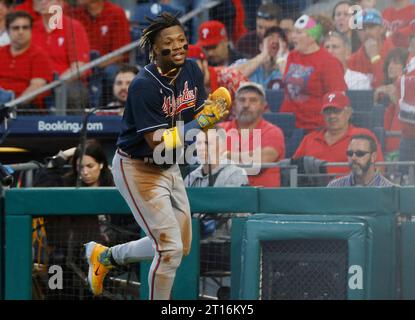 Atlanta, GA, USA. 04th July, 2019. Atlanta Braves infielder Ozzie Albies  (left) celebrates with outfielder Ronald Acu-a Jr. (right) after winning a  MLB game against the Philadelphia Phillies at SunTrust Park in