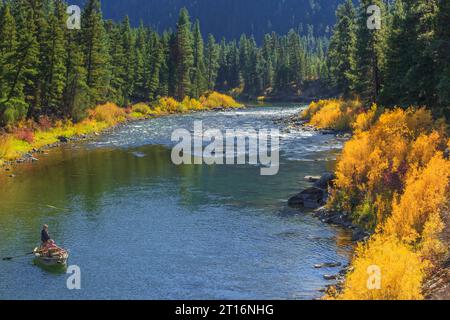 boaters fishing on the blackfoot river in autumn near potomac, montana Stock Photo