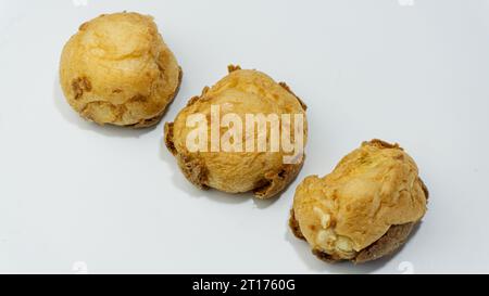 Eclairs with vanilla cream isolated on a white background Stock Photo