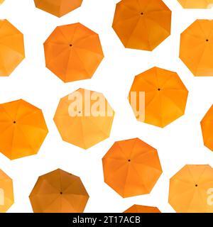 Seamless pattern of different orange colors umbrellas isolated on white background Stock Photo