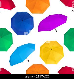 Seamless pattern of different colors colorful umbrellas isolated on white background Stock Photo