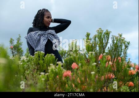 Woman seen standing in nature Stock Photo