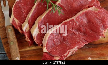 raw beef ribeye close-up on a cutting board Stock Photo