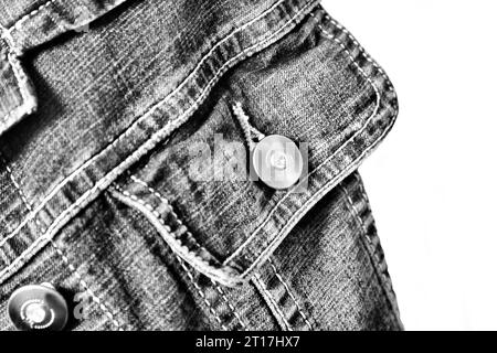 fragment of jeans jacket on the white background Stock Photo