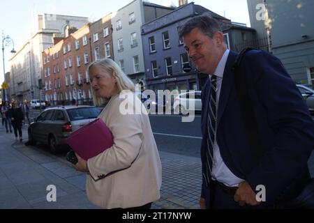 RTE director of legal affairs and group secretary Paula Mullooly and RTE director general Kevin Bakhurst arriving at Leinster House in Dublin to appear before the Public Accounts committee. Picture date: Thursday October 12, 2023. Stock Photo