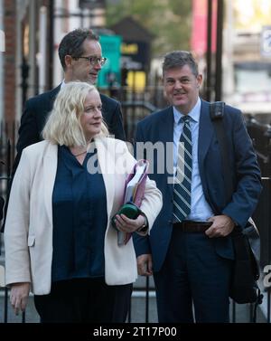 (left to right) RTE director of legal affairs and group secretary Paula Mullooly, acting deputy-general Adrian Lynch and RTE director general Kevin Bakhurst arriving at Leinster House in Dublin to appear before the Public Accounts committee. Picture date: Thursday October 12, 2023. Stock Photo