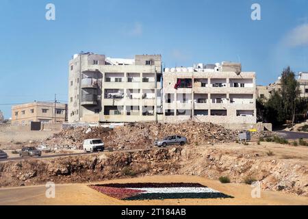 A view of the densely constructed homes at a hill in a typical Arab city in the Middle East. Stock Photo