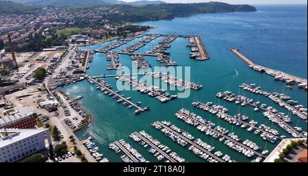 Aerial view embankment of the marina with boats in the Adriatic Sea in Izola fishing town, Slovenia Stock Photo