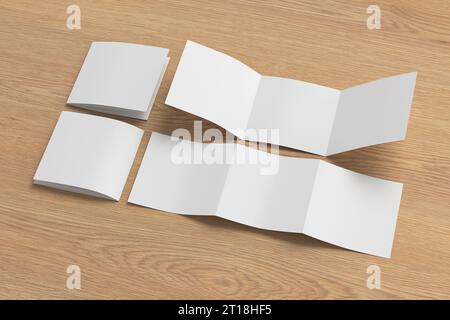 Square trifold roll brochure booklet mockup on wooden background Stock Photo