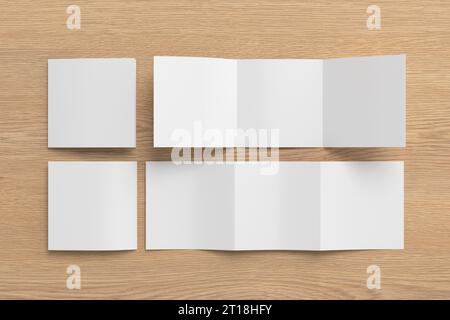 Square trifold roll brochure booklet mockup on wooden background Stock Photo
