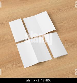 Half-folded flyer vertical booklet mockup on wooden background Stock Photo