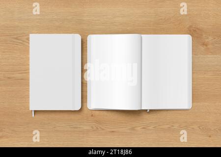 White cover notebook and opened notebook mockup on wooden background Stock Photo