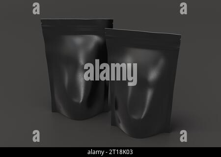 Black packaging pouches mockup for tea, coffee, snack on gray background. Branding mockup Stock Photo