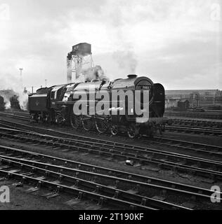 70013 Oliver Cromwell and others at 5A Crewe South loco.70013 had just arrived from Crewe works after it's last overhaul. 06th February 1967. Stock Photo