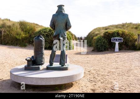 The Lone Sailor statue was designed by american sculptor Stanley Bleifeld in tribute to american sailors and installed facing Utah Beach in Normandy. Stock Photo