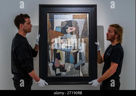 London, UK. 12th Oct, 2023. Pablo Picasso, Femme en corset lisant un livre, 1914-1917, Estimate $15,000,000 - 20,000,000 - Unveiling in London of Highlights from Living the Avant-Garde: The Triton Collection Foundation, which will be in Phillips' Dedicated Evening Sale on 14 November in New York. Credit: Guy Bell/Alamy Live News Stock Photo