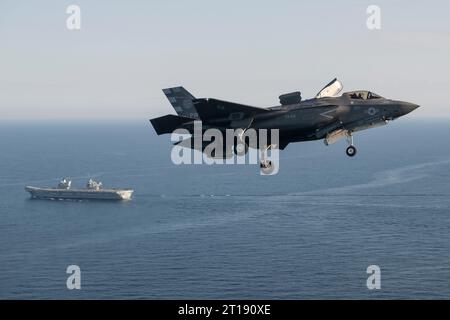 Patuxent River, United States. 11th Oct, 2023. A U.S. Marine Corps F-35B stealth fighter aircraft flown by USMC Test pilot, Maj Paul Gucwa approaches to land on the flight deck of the Royal Navy Queen Elizabeth-class aircraft carrier HMS Prince of Wales during final First of Class sea trials, October 11, 2023 off the coast of Maryland, USA. Credit: Dane Wiedmann/U.S. Navy Photo/Alamy Live News Stock Photo