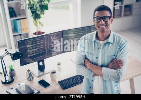 Portrait of attractive guy confident skilled front end developer programmers team lead professional it specialist in home office workstation Stock Photo