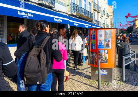 Lisbon, Portugal - January 6, 2023: People lining up to buy the worldwide famous Belem Pastries. Stock Photo