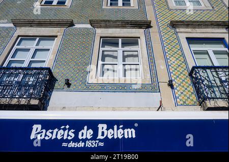 Lisbon, Portugal - January 6, 2023: Tiled facade of an old building with the sign Belem Pastries. Stock Photo