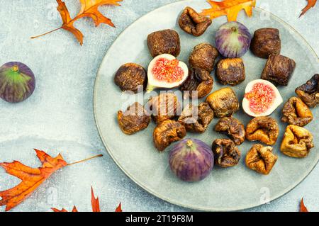 Fig tree fruits, dried figs. Dried fruit on the plate Stock Photo