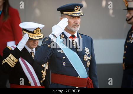 King Felipe VI of Spain greets the Spanish armed forces at the start of the Spanish National Holiday parade. The King of Spain, Felipe VI, and his daughter, Princess Leonor de Borbón, lead the parade of the National Holiday of Spain, celebrated on October 12, commemorating the day Christopher Columbus arrived in America, the parade was held in the Paseo de la Castellana in Madrid. (Photo by Diego Radames / SOPA Images/Sipa USA) Stock Photo