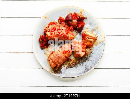 Delicious meat rolls with autumn figs on the plate Stock Photo