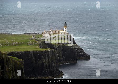 The impressive lighthouse and landscape at Nest Point, Scotland. Stock Photo