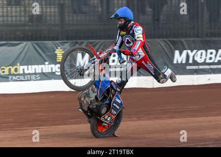 Brady Kurtz - Belle Vue Aces speedway rider.  Action portrait doing a celebratory wheelie Stock Photo