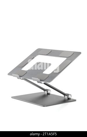 Aluminum laptop stand, to improve ventilation on a white background in isolation Stock Photo