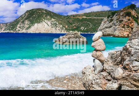 Scenic beaches of beautiful Cephalonia (Kefalonia) island - Agia Eleni with picturesque rocks and stone's piramids. Greece , Ionian islands Stock Photo