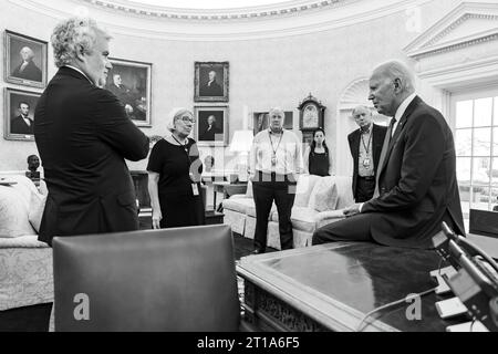 President Joe Biden goes over the week ahead plan now that the government is no longer going to be shut down on Sunday, October 1, 2023, after Congress passed a bill to keep the federal government open through November 17, 2023. (Official White House Photo by Adam Schultz) Stock Photo