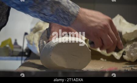 The process of processing and polishing plaster figures. A factory for ...