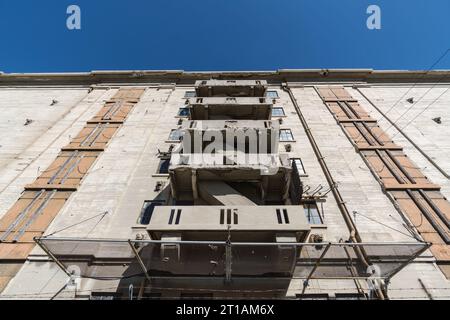 Historic concrete warehouse with crumbing fire escapes owned by Port of Los Angeles in San Pedro California. Stock Photo