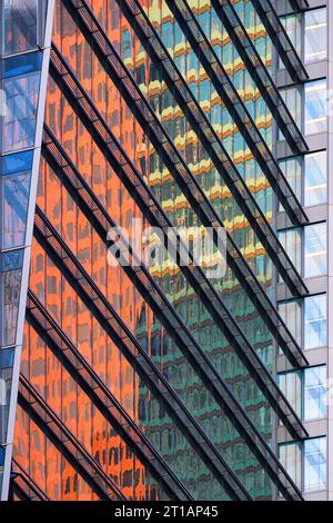 Architectural abstract of colors and patterns in window reflections on Adelaide Street in downtown Toronto, Ontario Stock Photo
