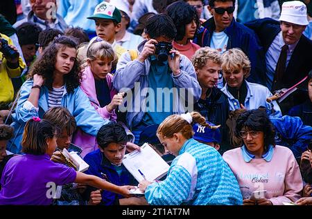 Monica Seles (YUG) signing autographs for fans at the 1989 French Open Tennis. Stock Photo