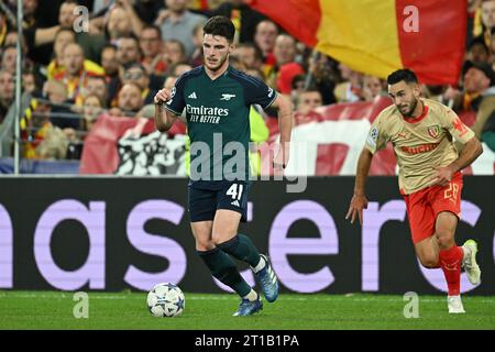 Declan Rice (41) of Arsenal and Adrien Thomasson (28) of RC Lens pictured during the Uefa Champions League matchday 2 game in group B in the 2023-2024 season between Racing Club de Lens and Arsenal FC on October 3 , 2023 in Lens, France. (Photo by David Catry / Sportpix ) Stock Photo