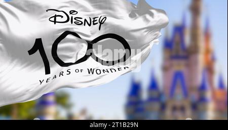 Orland, US, October 10 2023: Celebratory flag for the 100th anniversary of the Walt Disney Company waving in the wind. Illustrative editorial 3d illus Stock Photo