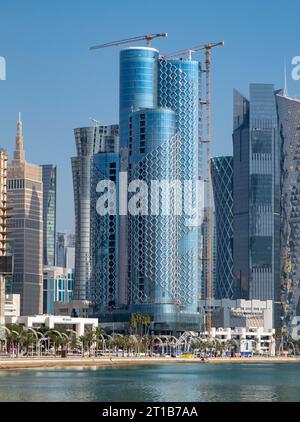 Skyline of West Bay with Corniche Park Towers aka QIMC Tower, Doha, Qatar Stock Photo