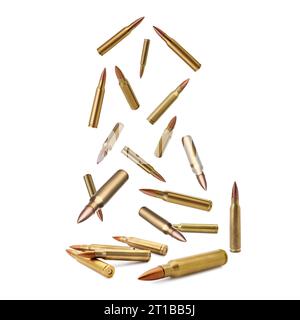 Many bullets falling on white background. Firearm ammunition Stock Photo