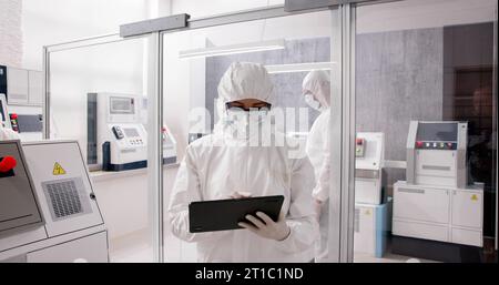 Pharmaceutical Industry Manufacturing Factory. Medical Engineer Using Technology Stock Photo