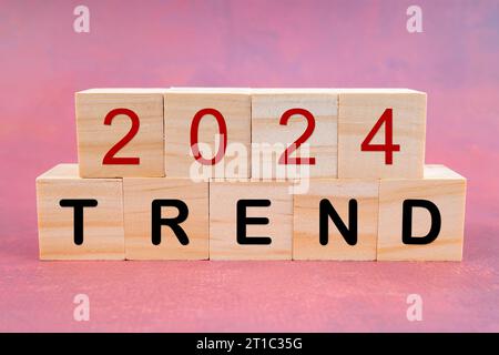 2024 TREND text on wooden cubes. Business and New Year concepts. Stock Photo