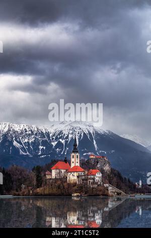 Bled, Slovenia - Beautiful view of Lake Bled (Blejsko Jezero) with reflecting Pilgrimage Church of the Assumption of Maria on Bled Island, Bled Castle Stock Photo