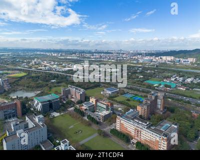 National Taipei University Aerial View at Sanxia, New Taipei City, Taiwan. Beautiful campus with sunset and green grass. Stock Photo