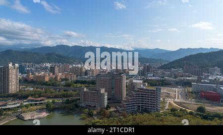 National Taipei University Aerial View at Sanxia, New Taipei City, Taiwan. Beautiful campus with sunset and green grass. Stock Photo